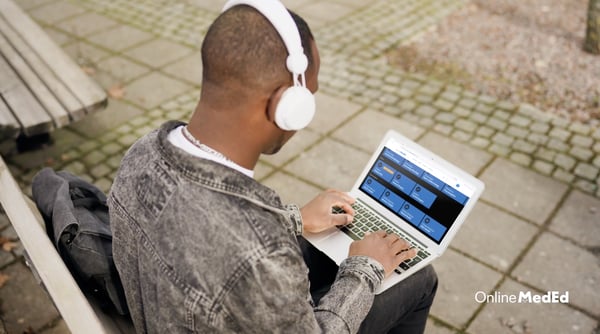 Student on Laptop with OME